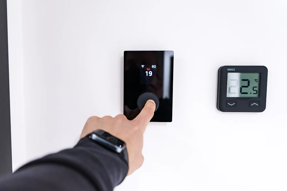 Setting a thermostat after a service visit
